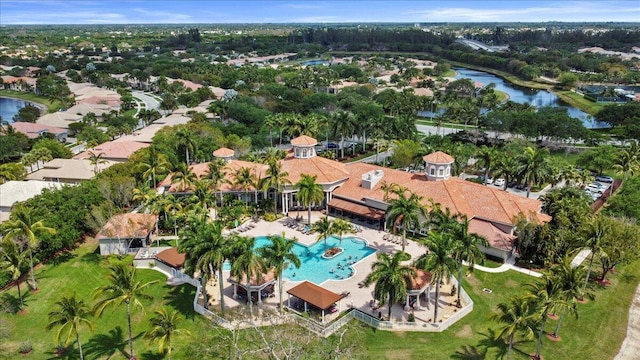 8839 Via Avellino, Lake Worth, FL 33467 - aerial view of property's location with a nearby body of water, a pool, and nearby suburban area