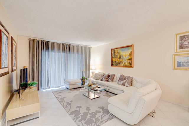 living room with a textured ceiling