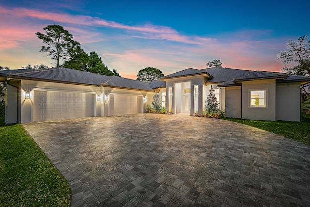 prairie-style home with a garage