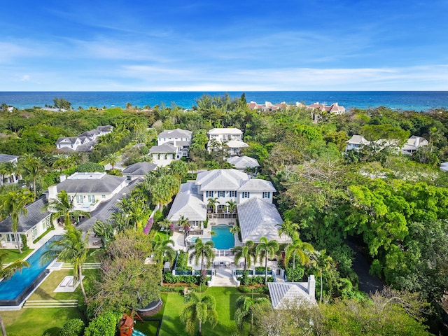 drone / aerial view with a water view