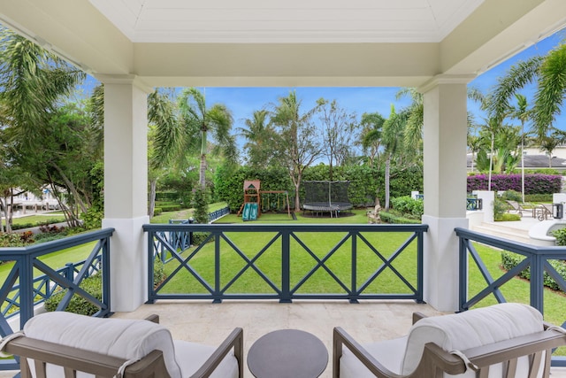 view of patio / terrace featuring a playground and a trampoline