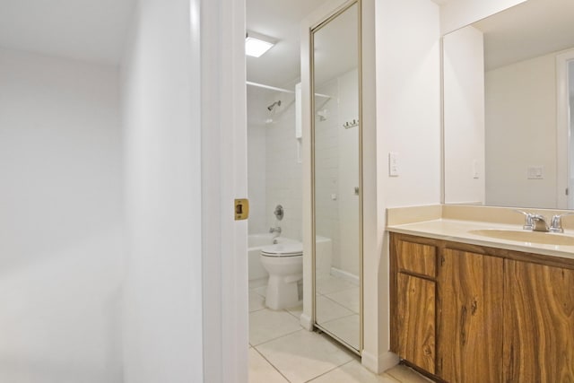 full bathroom with vanity, tiled shower / bath combo, toilet, and tile patterned floors