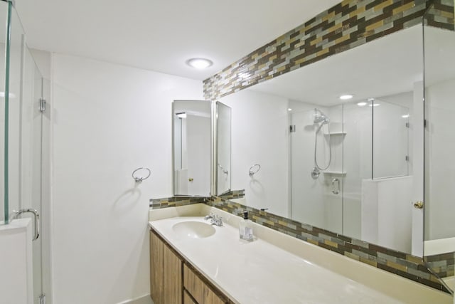 bathroom with vanity and walk in shower