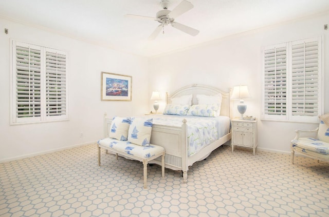 bedroom with crown molding and ceiling fan