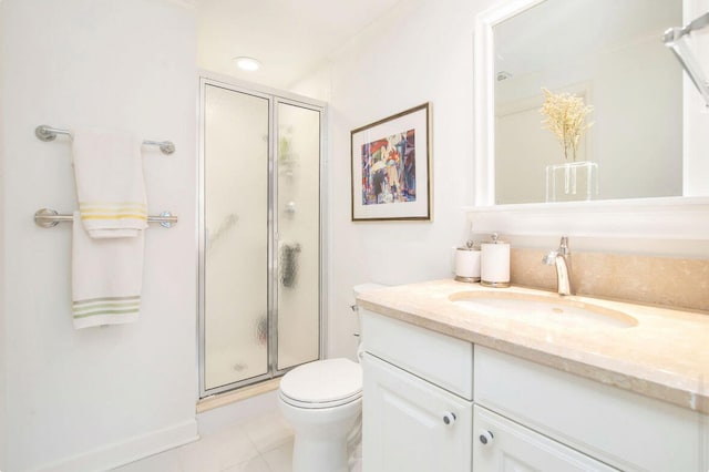 bathroom featuring vanity, tile floors, a shower with door, and toilet