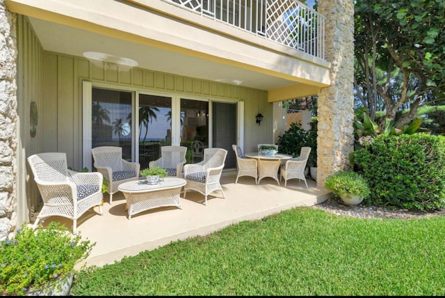 view of patio with a balcony