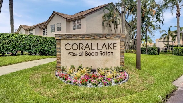 community sign with a yard