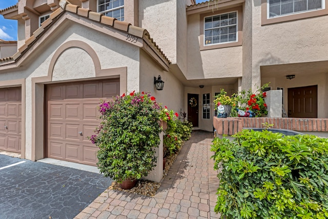 entrance to property with a garage