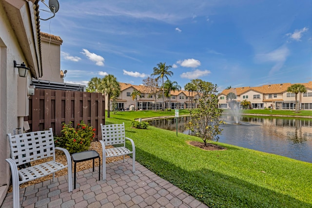 view of patio / terrace with a water view