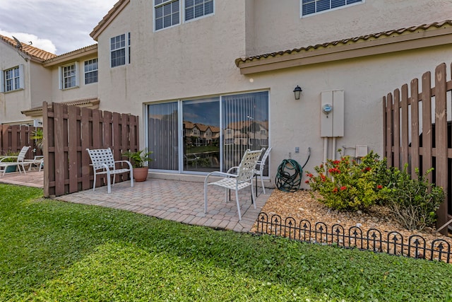 rear view of property with a patio