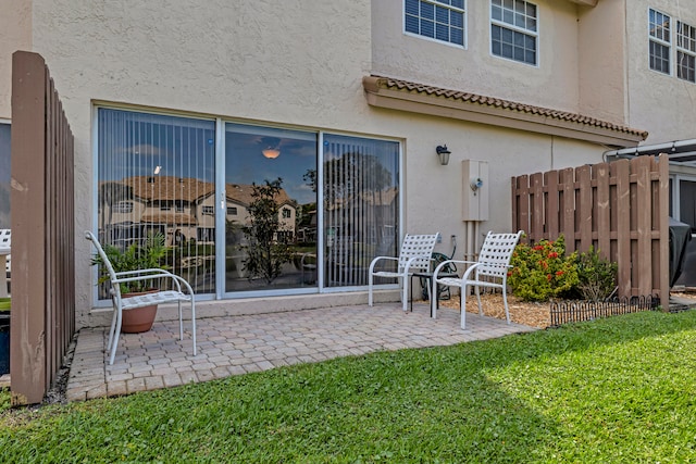 exterior space featuring a yard and a patio area