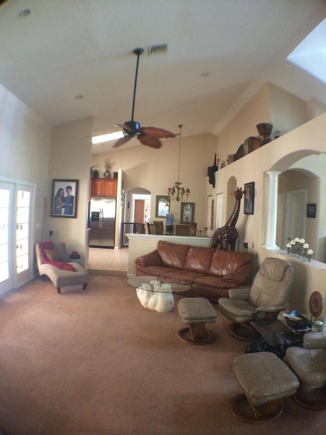 living room featuring high vaulted ceiling, french doors, ceiling fan, and light tile floors