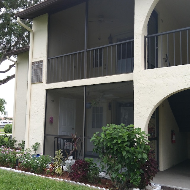 view of home's exterior featuring a balcony