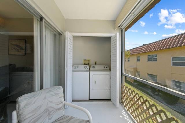 laundry area with washer hookup and washing machine and clothes dryer