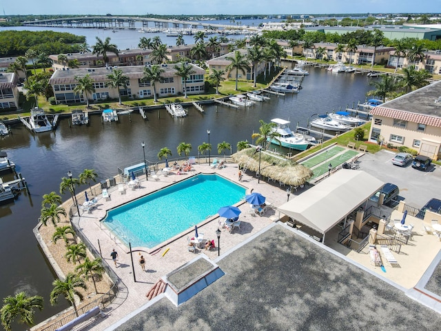 birds eye view of property featuring a water view