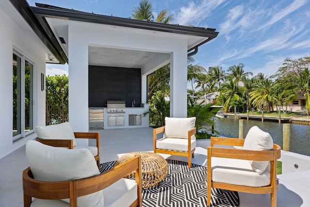 view of terrace featuring an outdoor hangout area, grilling area, area for grilling, and a water view