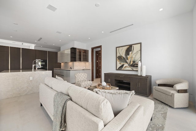 tiled living room with a fireplace