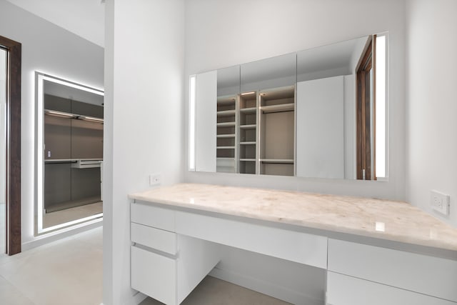 bathroom featuring large vanity