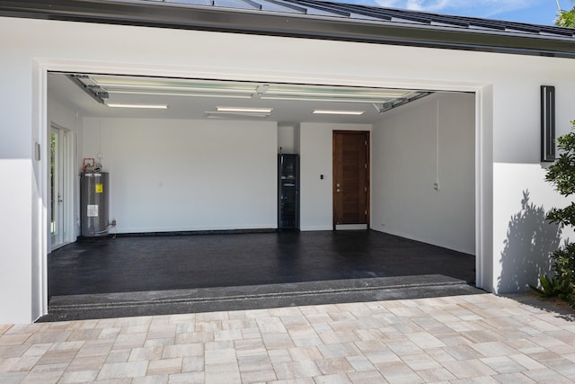 garage featuring water heater