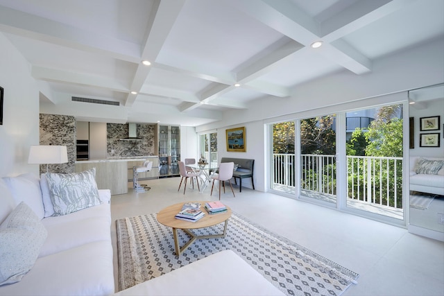 living room with light tile floors, coffered ceiling, and beam ceiling