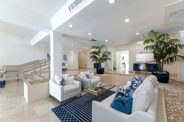 living room featuring light tile flooring