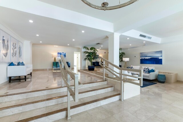 stairway with light tile floors