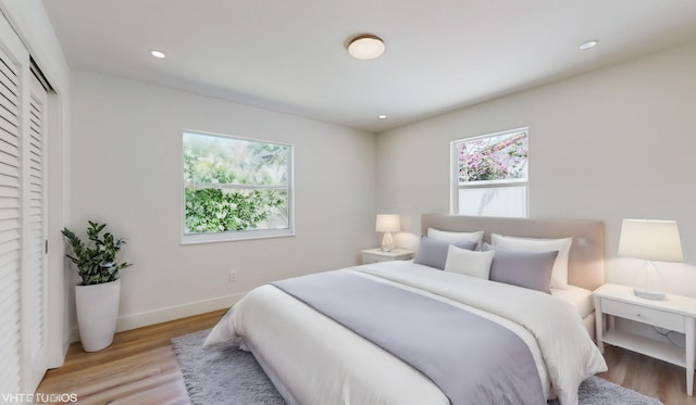 bedroom featuring light wood-type flooring