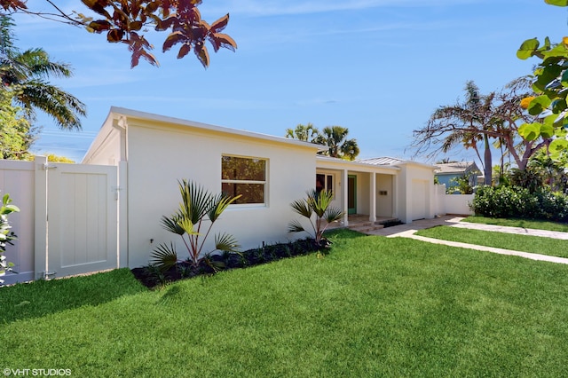 view of front of home with a front lawn