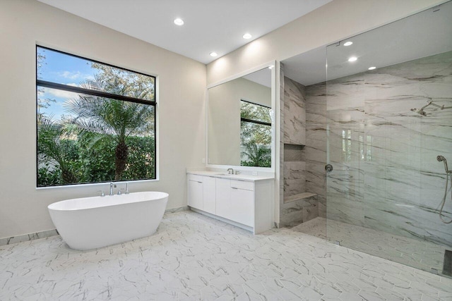 bathroom with plus walk in shower and vanity