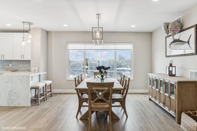 dining area featuring light hardwood / wood-style flooring