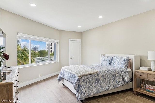 bedroom featuring light wood-type flooring