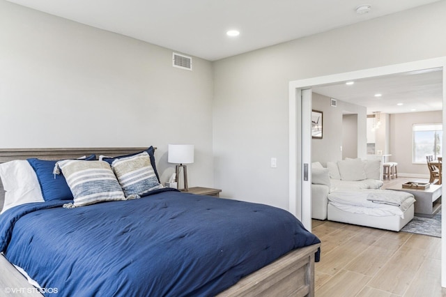 bedroom featuring light wood-type flooring