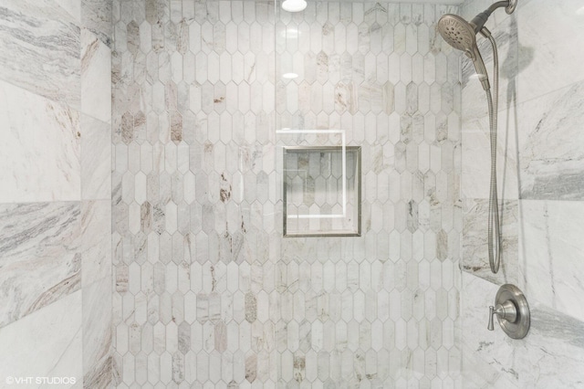 details with a tile shower