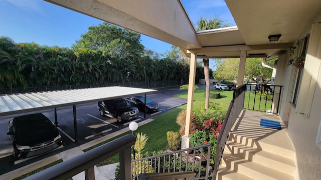 exterior space featuring a carport