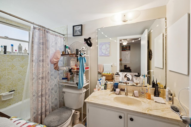 full bathroom featuring toilet, shower / bath combo, and vanity