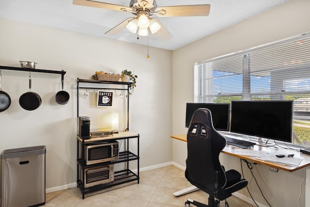 tiled office space with ceiling fan