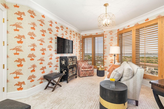 living room featuring an inviting chandelier and ornamental molding