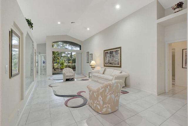 living room featuring light tile patterned floors and lofted ceiling