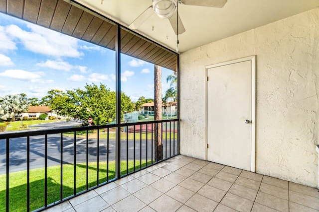 balcony featuring ceiling fan