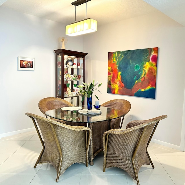 dining room featuring light tile patterned floors