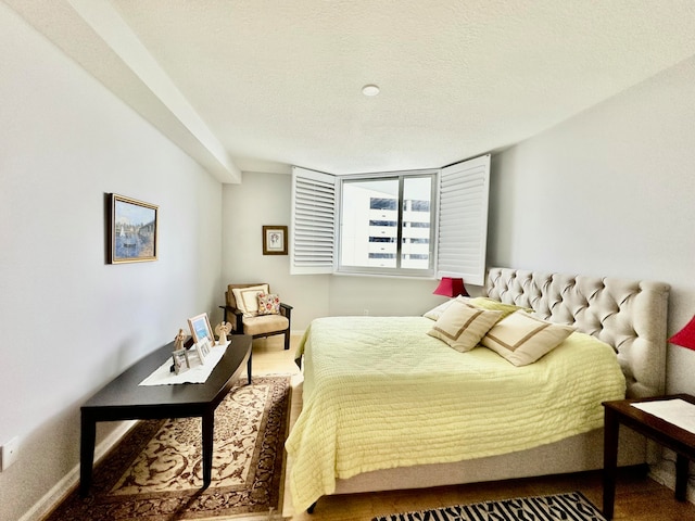 bedroom featuring a textured ceiling