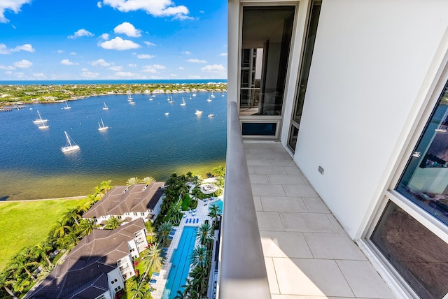 balcony featuring a water view