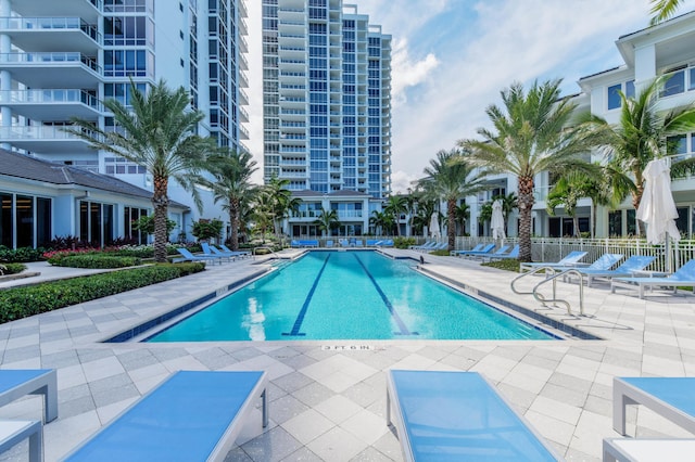 view of swimming pool featuring a patio area