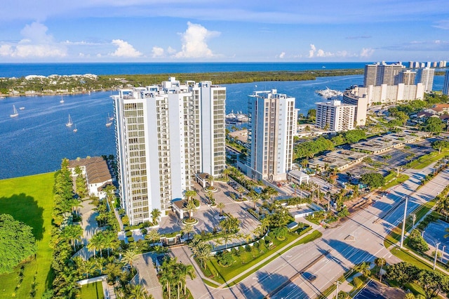 birds eye view of property featuring a water view