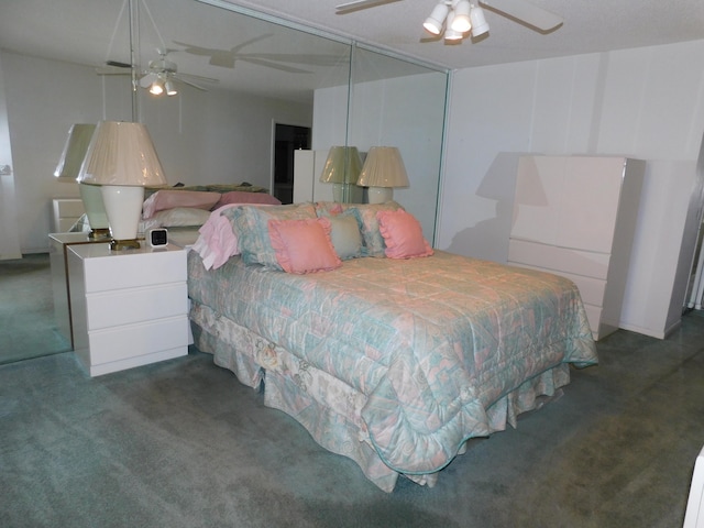 carpeted bedroom with ceiling fan