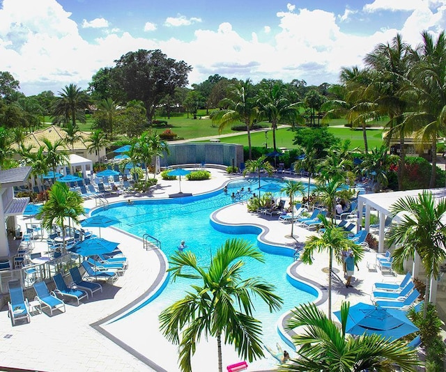 view of pool featuring a community hot tub and a patio