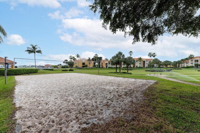 view of home's community with a lawn