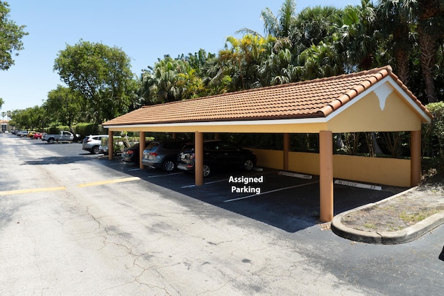 view of car parking featuring a carport