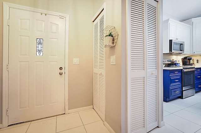 view of tiled foyer entrance