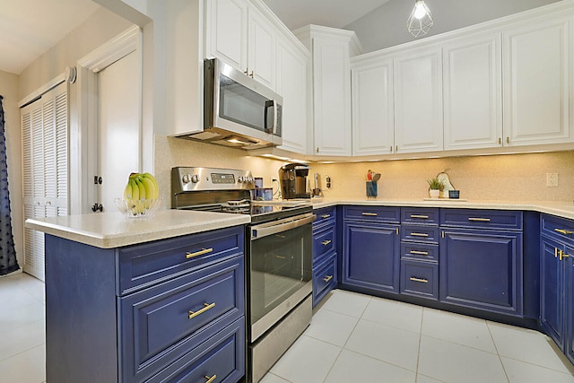 kitchen featuring white cabinets, appliances with stainless steel finishes, light tile patterned floors, and blue cabinets